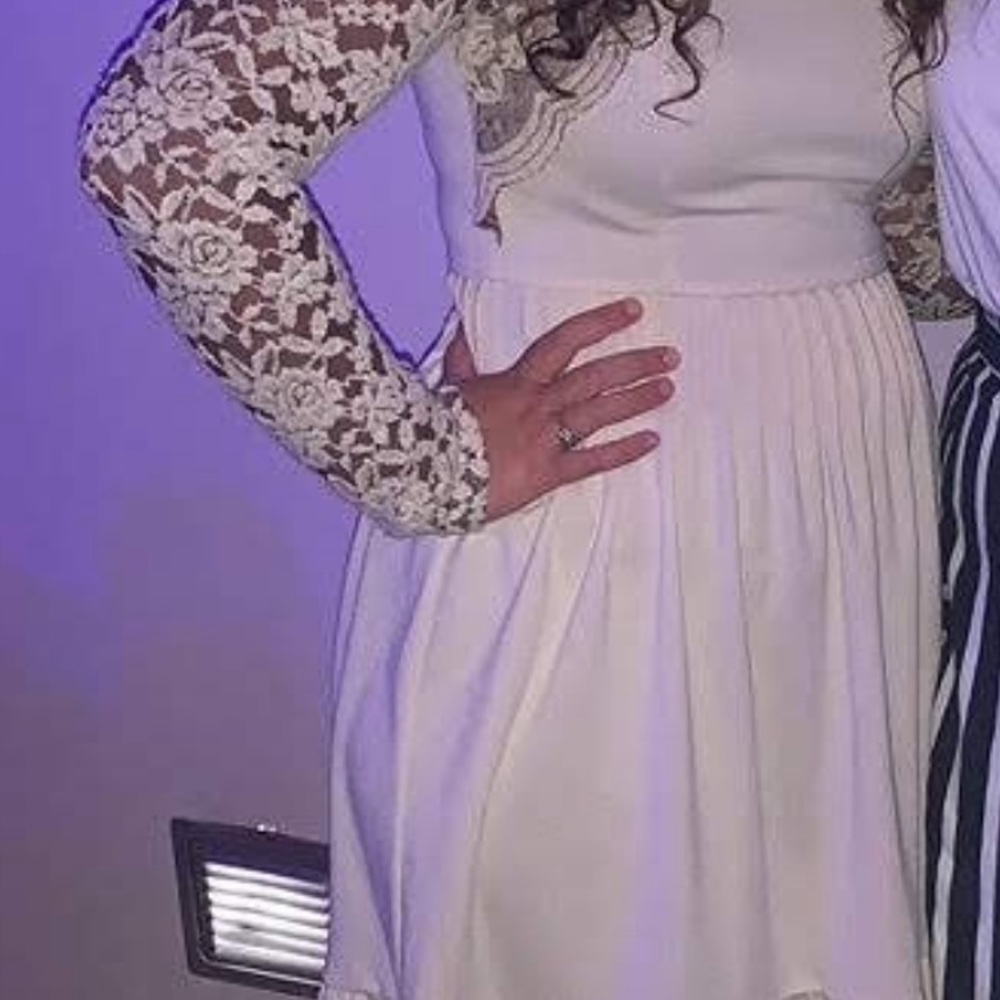 dress with flower print going down the sleeves